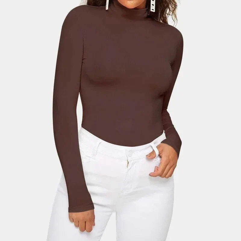 A cosy and stylish turtleneck top in a classic solid colour, perfect for layering and staying warm during the Kiwi autumn and winter seasons.