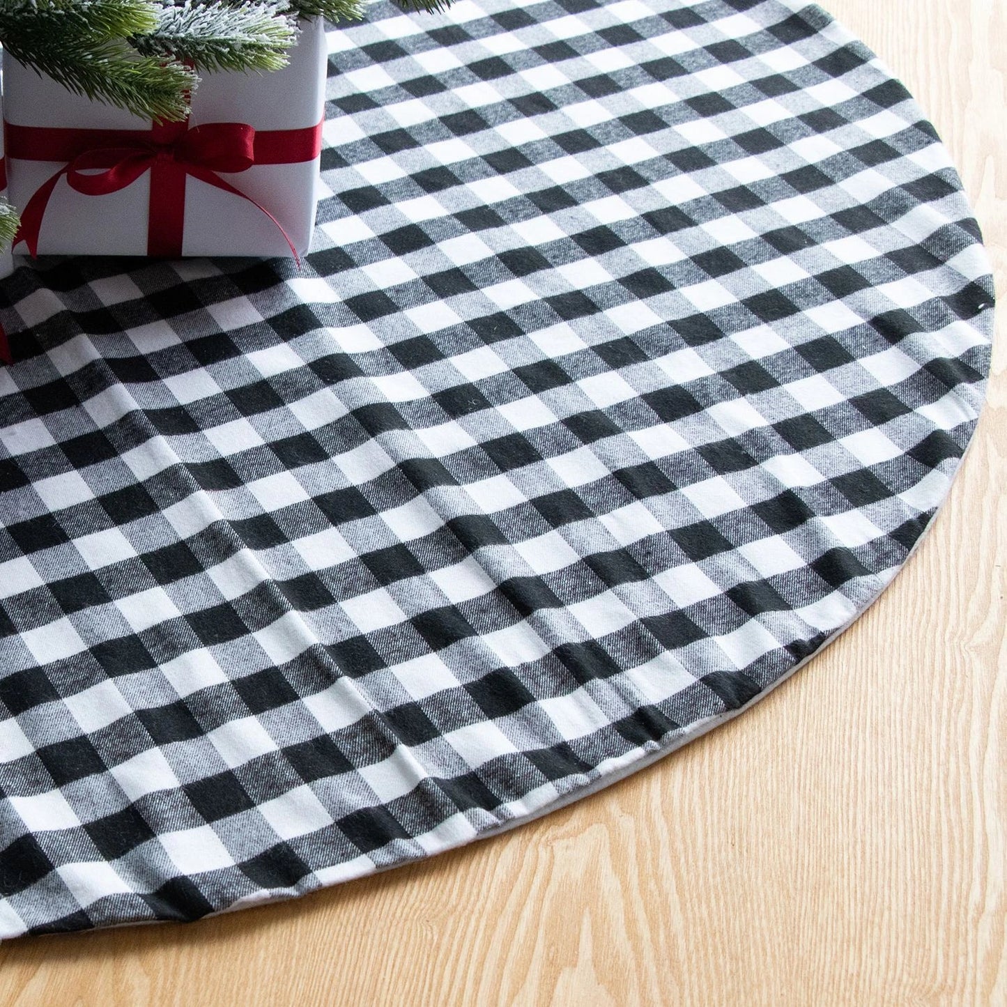 Stylish black and white plaid Christmas tree skirt with versatile size options