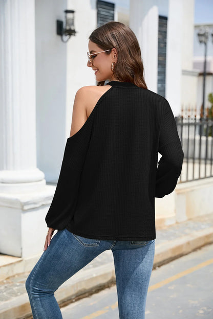 A stylish off-the-shoulder top with long lantern sleeves and a crew neck, available in a variety of classic Kiwi-inspired colours.