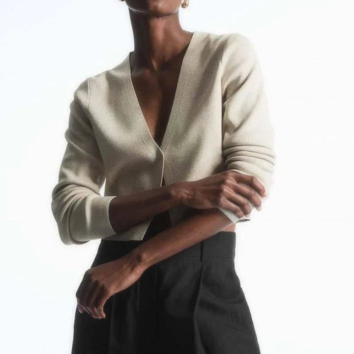 Stylish V-Neck Merino Wool Cardigan in a classic solid color, perfect for layering during the Kiwi winter season.