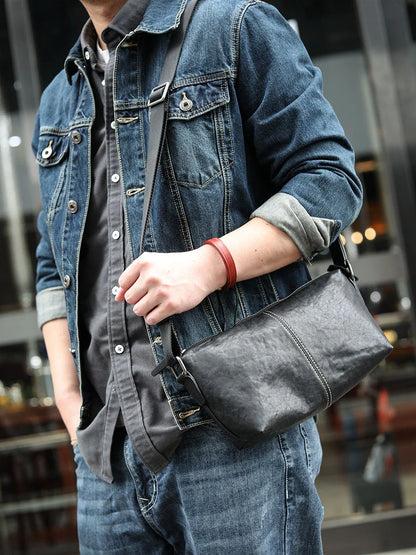 Stylish leather messenger bag with zipper closure and adjustable shoulder strap, perfect for Kiwi men's everyday carry