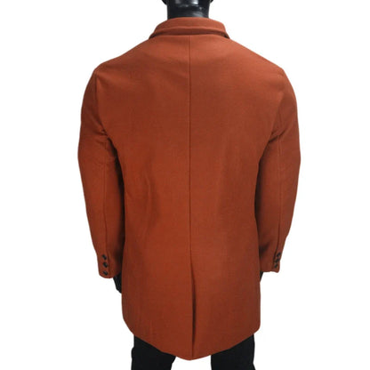 A stylish and warm wool coat for men, featuring a streamlined European-inspired design and practical side pockets.
