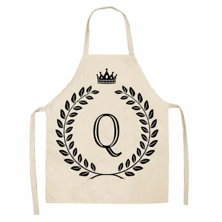 A crown and letter printed kitchen apron made of high-quality cotton and linen, suitable for both men and women in New Zealand kitchens.
