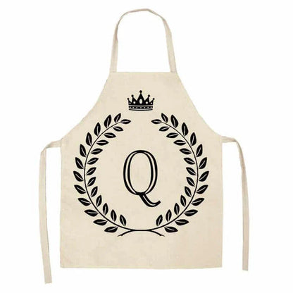 A crown and letter printed kitchen apron made of high-quality cotton and linen, suitable for both men and women in New Zealand kitchens.