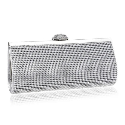 A glamorous gold rhinestone-embellished evening clutch with a sleek, hard exterior and fashionable hasp closure.