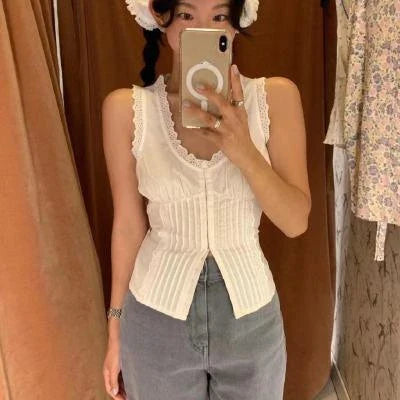 A stylish embroidered lace tank top with a sweet u-collar neckline, made from premium Kiwi-grown cotton.