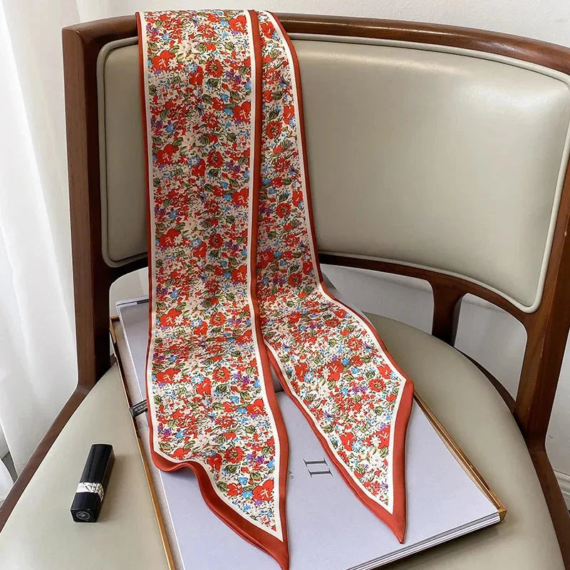 Elegant floral print scarf in soft, cotton-like polyester fabric - a versatile Kiwi accessory for year-round style