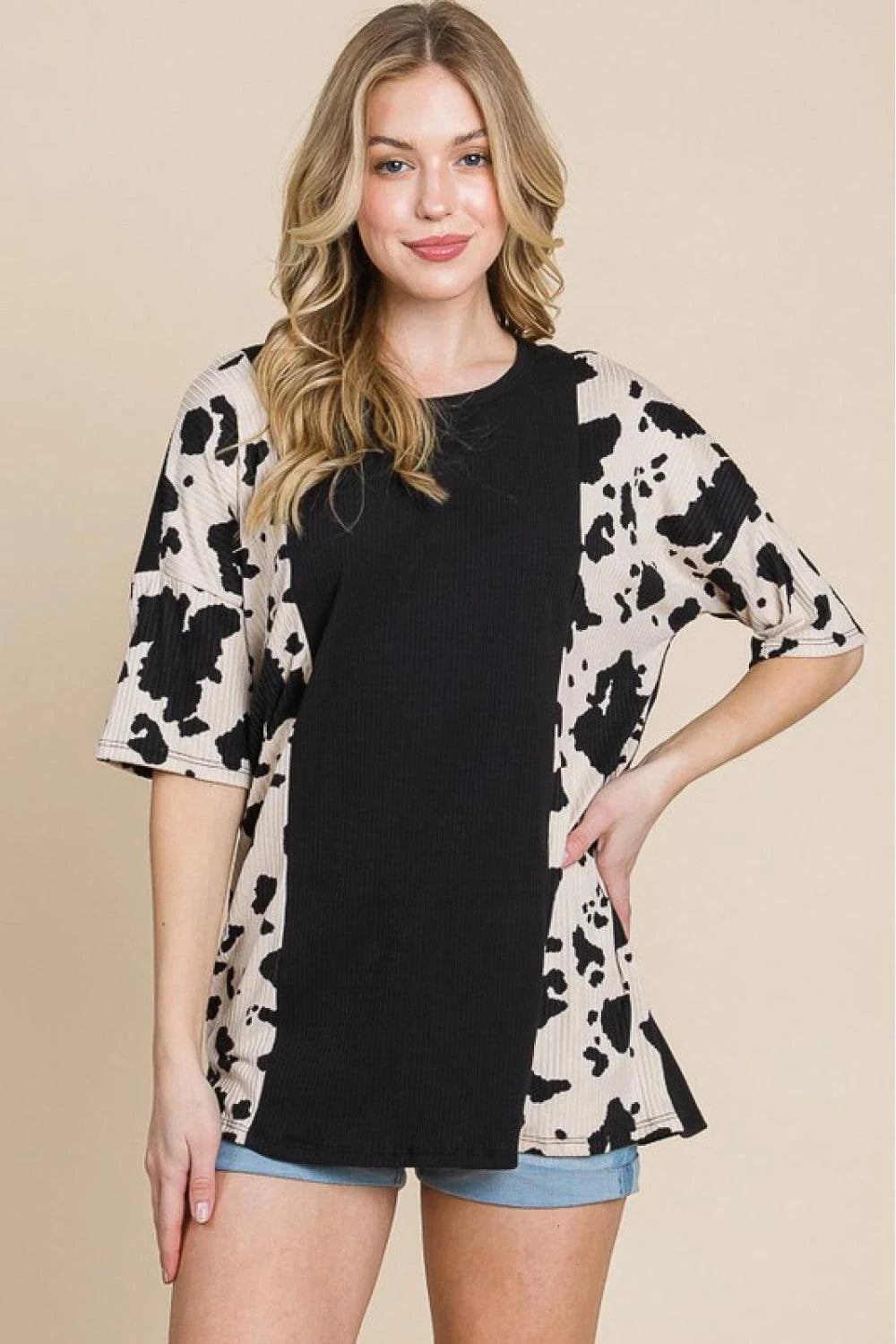 Stylish cow-print tee with ribbed fabric for Kiwi ladies, perfect for casual outings or night out with friends