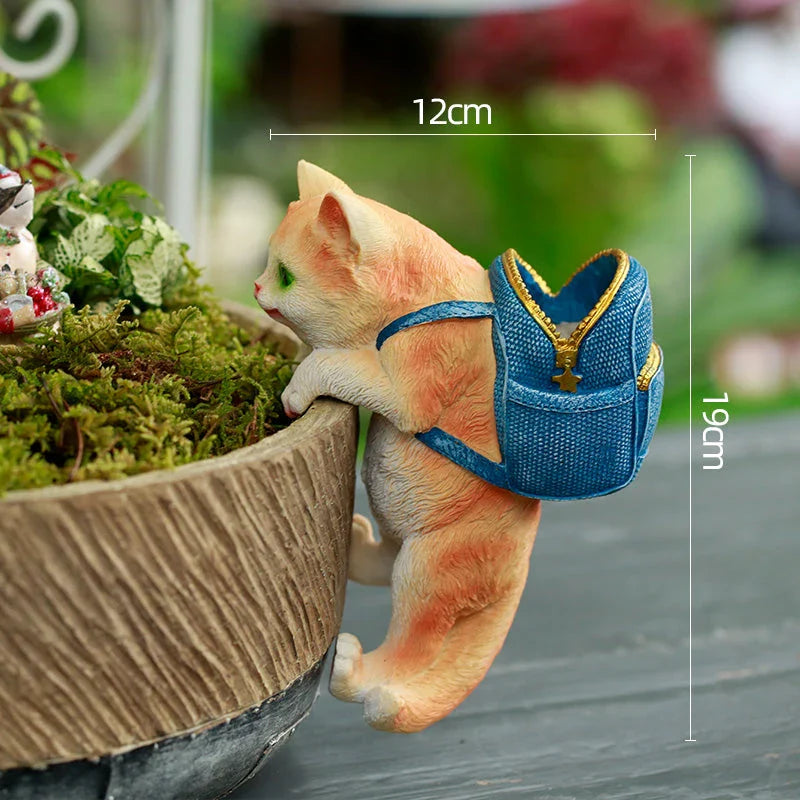 Charming cat backpack-shaped garden ornament made of weather-resistant resin, perfect for adding Kiwiana style and storage to your outdoor space