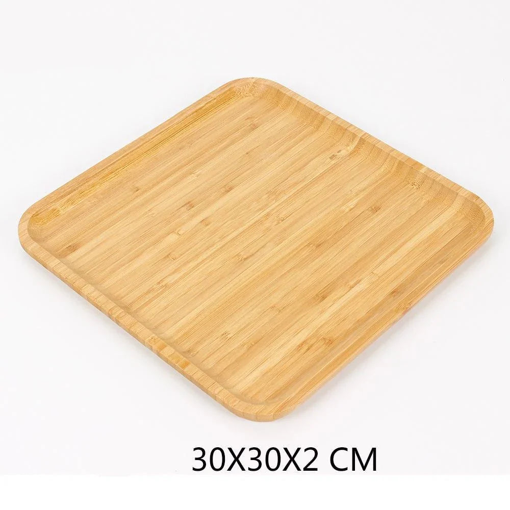 Bamboo serving tray with a sleek, minimalist design for serving food, drinks, or as a decorative piece in a modern kitchen