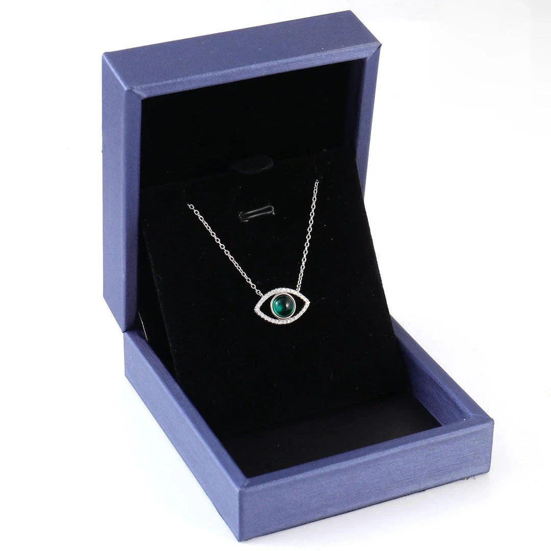 Elegant silver necklace with a captivating cultivated emerald stone, the perfect accessory for Kiwis to elevate their style.