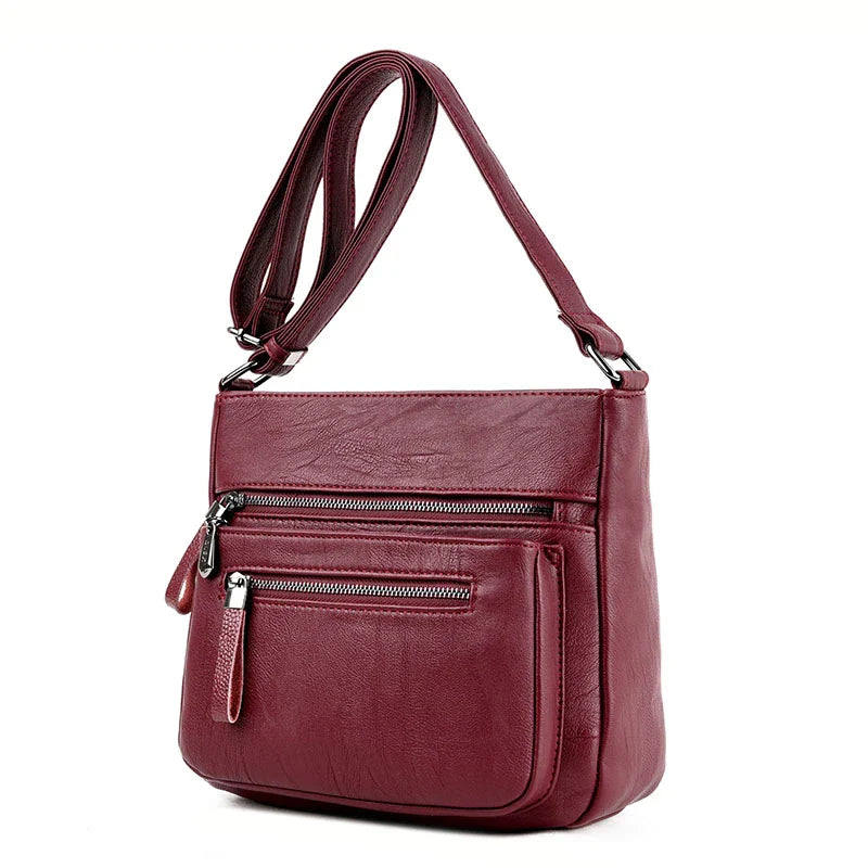 Soft leather shoulder bag in a classic box shape with a trendy tote silhouette, perfect for the modern Kiwi mum