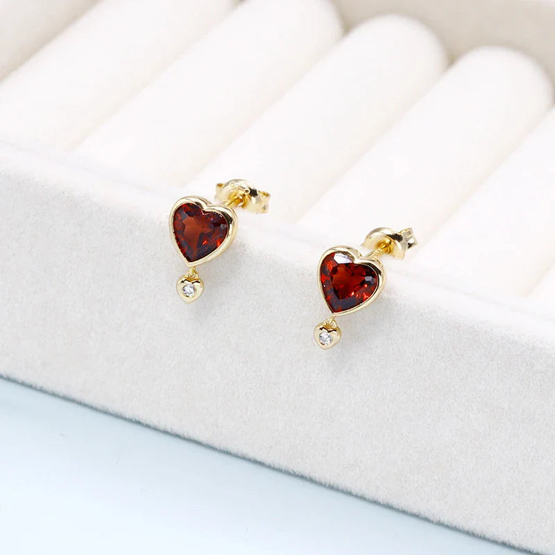Stylish pomegranate garnet and zircon earrings in silver setting, with retro-inspired silhouette and vibrant gemstone accents