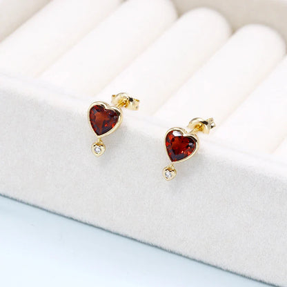 Stylish pomegranate garnet and zircon earrings in silver setting, with retro-inspired silhouette and vibrant gemstone accents