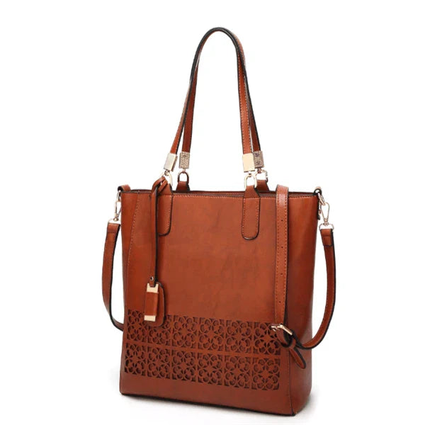 Stylish hollow handbag with adjustable straps, multiple interior pockets, and a durable PU leather construction