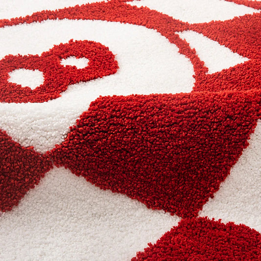 Vibrant 8 ball-inspired tufted area rug in red or black, perfect for adding a playful touch to Kiwi homes