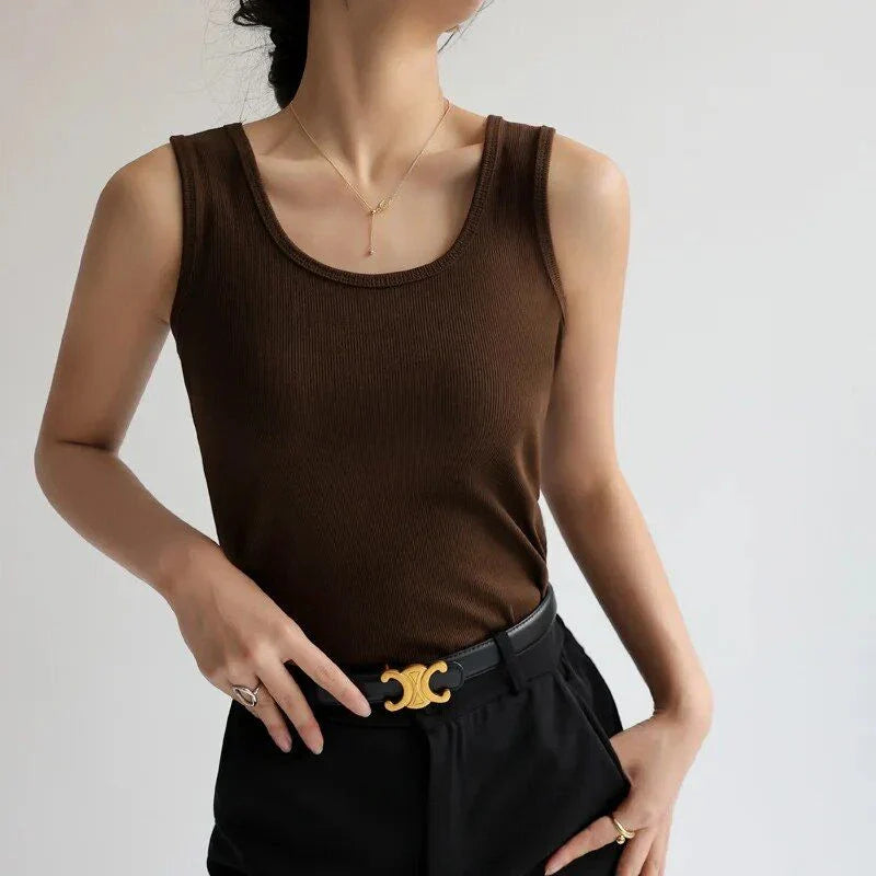 Stylish and versatile solid color tank top with chic strap detail, perfect for Kiwi summer fashion