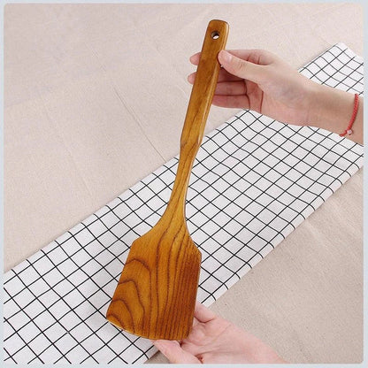 Versatile Wooden Turner - a high-quality, long-handled kitchen tool made from sustainable New Zealand timber for flipping, tossing, and maneuvering food with ease.