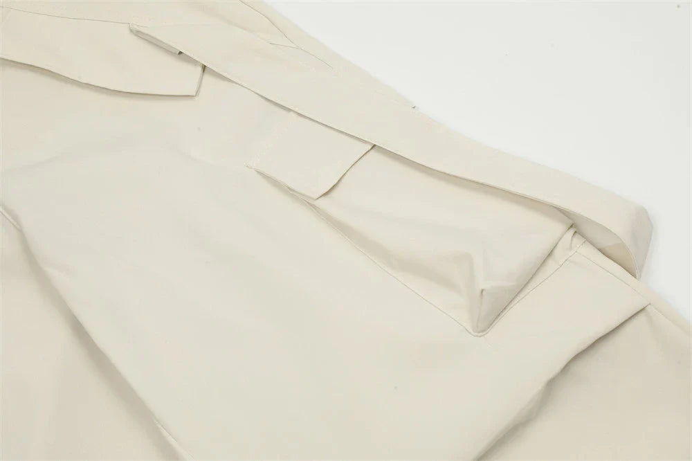 Stylish black overalls with pleated pockets, designed for the active Kiwi lifestyle