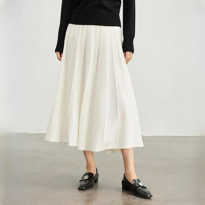 A stylish and versatile mid-calf pleated wool skirt in a chocolate color, perfect for the chilly seasons.