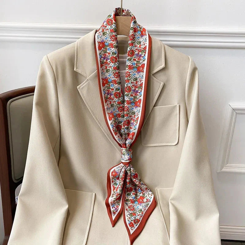 Elegant floral print scarf in soft, cotton-like polyester fabric - a versatile Kiwi accessory for year-round style