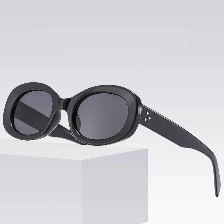 Stylish retro oval sunglasses with gradient lenses and a lightweight plastic frame, perfect for Kiwi adventures