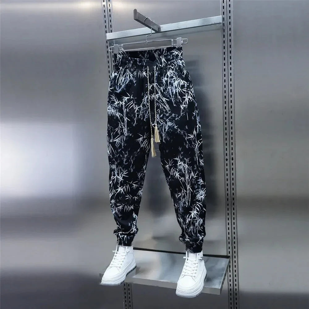 Men's summer harem pants in black and milky white colors, made from lightweight and breathable ice silk fabric