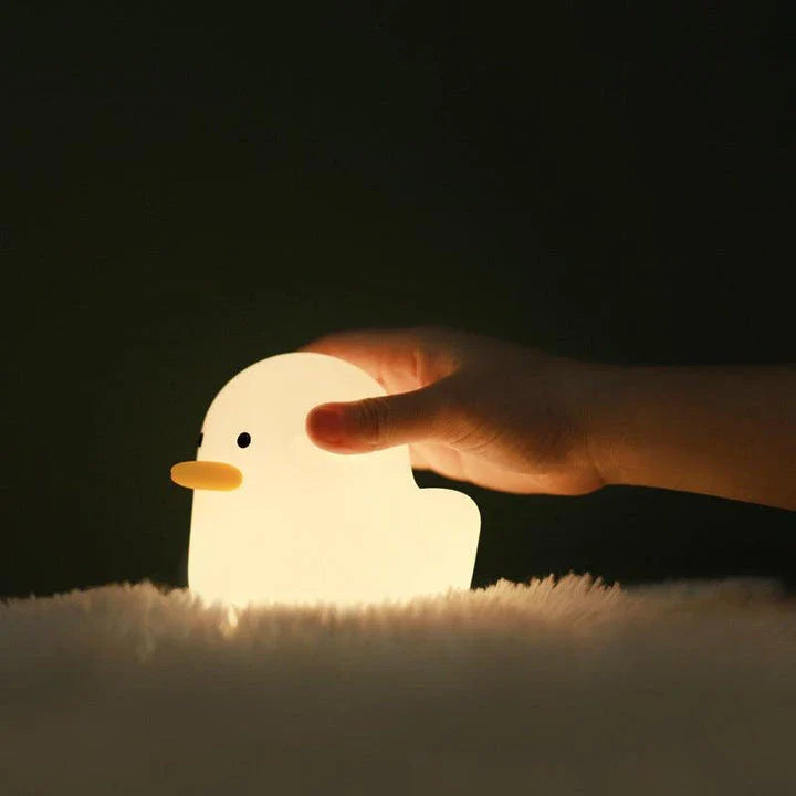 Enchanting Dull Duck LED Night Light with soft silicone body and customizable dimmable lights, perfect for bedrooms and kids' rooms