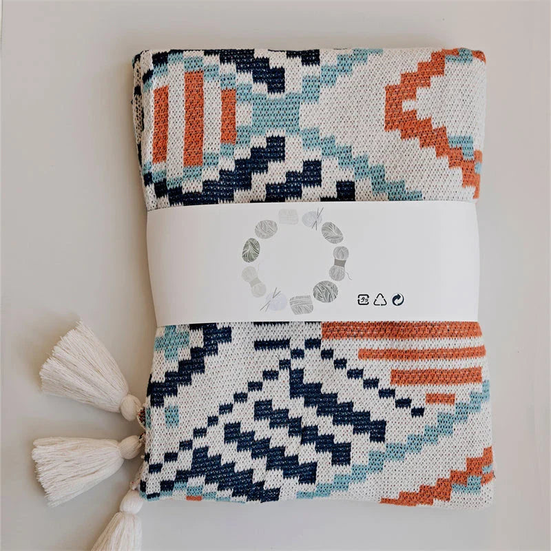 Cozy boho geometric cotton blanket in multicolor design, perfect for adding style and comfort to Kiwi homes and outdoor spaces