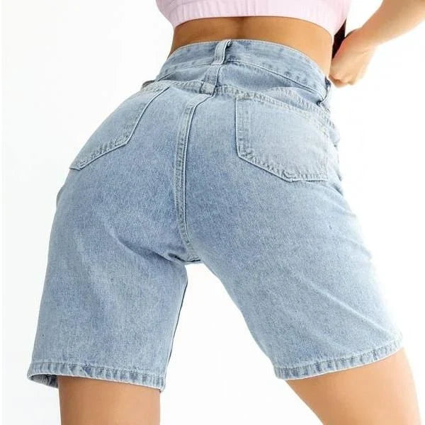 Classic blue knee-length denim shorts with high-waisted design, button fly closure, and wide-leg silhouette