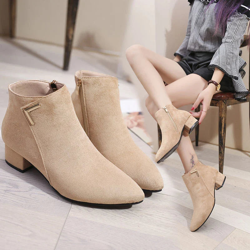 Pointed toe boots with low chunky heels in Black and Beige colors, designed for comfortable and stylish wear in New Zealand