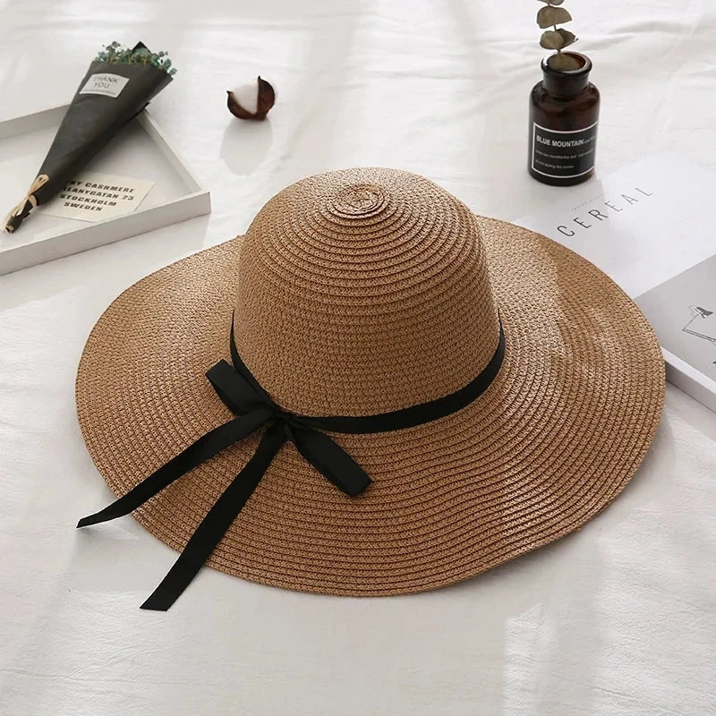 Fashionable summer straw hat for Kiwi women with wide brim and bow detail for sun protection and stylish look