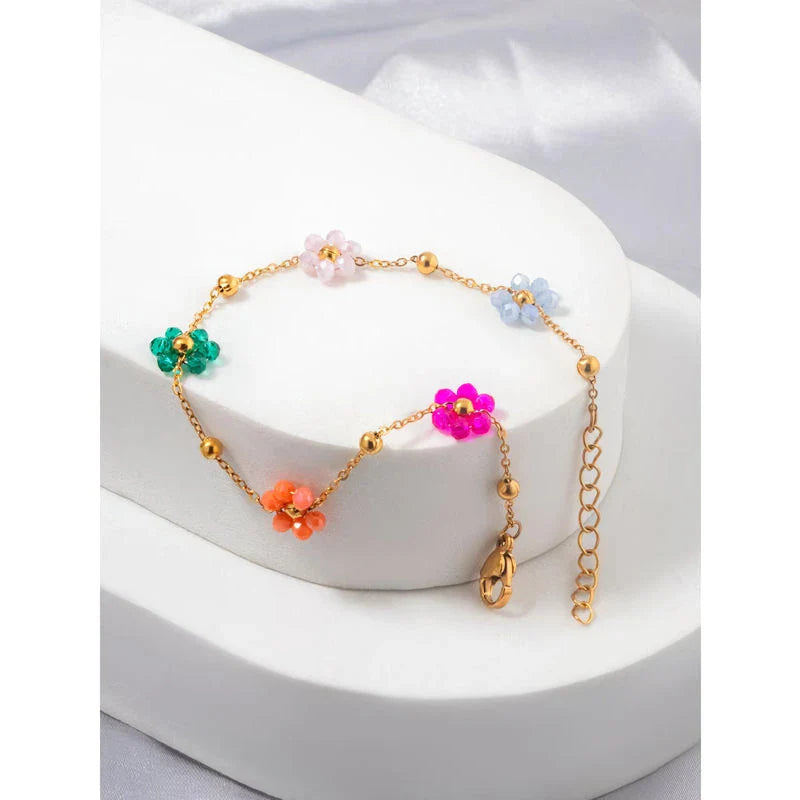 Vibrant, colorful flower-beaded stainless steel bracelet with adjustable chain and link design