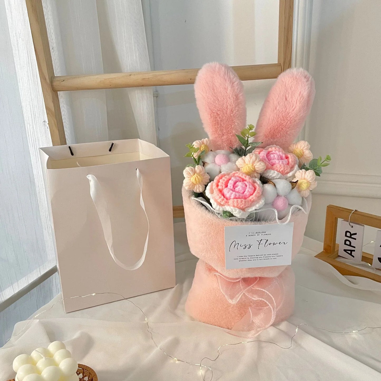 Creative knitted rabbit ear bouquet doll in vibrant colours, a unique and eco-friendly home accessory from New Zealand