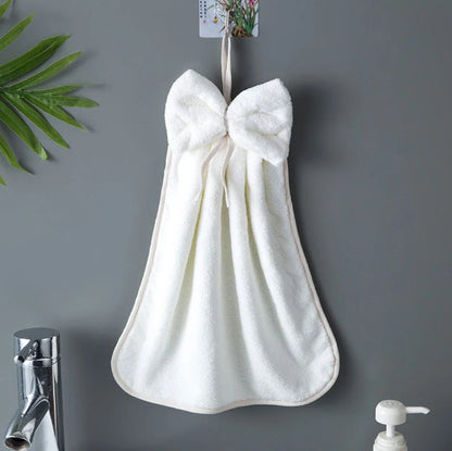 Soft, absorbent coral velvet hand towels with a unique bow design, perfect for Kiwi homes