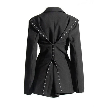 A stylish autumn blazer with a notched metal buckle decoration and camouflage pattern, designed for the modern Kiwi woman