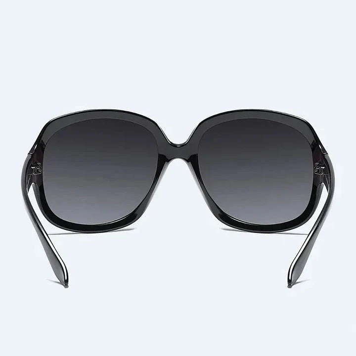 Elegant oversized polarized sunglasses with gradient tint, offering UV protection and style for Kiwi fashionistas