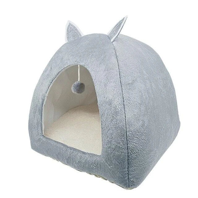 Cosy and foldable cat bed with interactive ball toy, available in a range of stylish colours to match your home decor