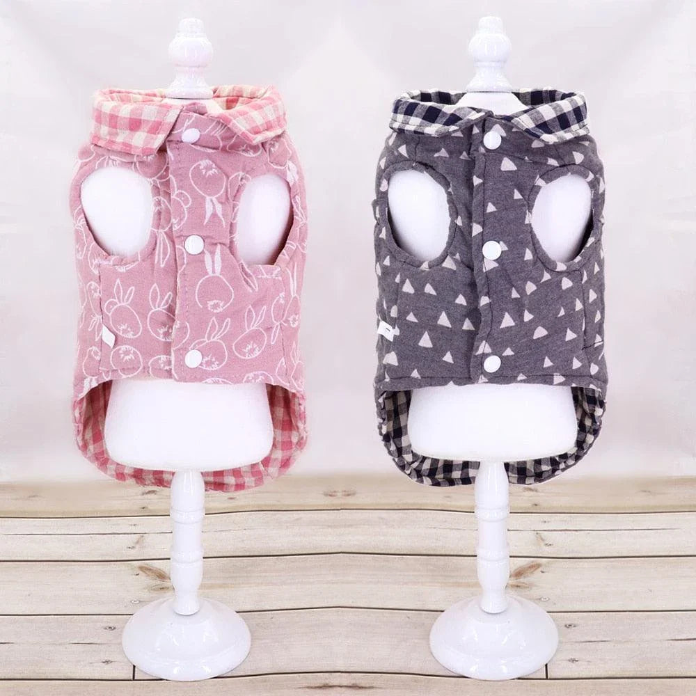 Stylish plaid pet vest for dogs in a variety of sizes, featuring a sleeveless design and durable polyester material.