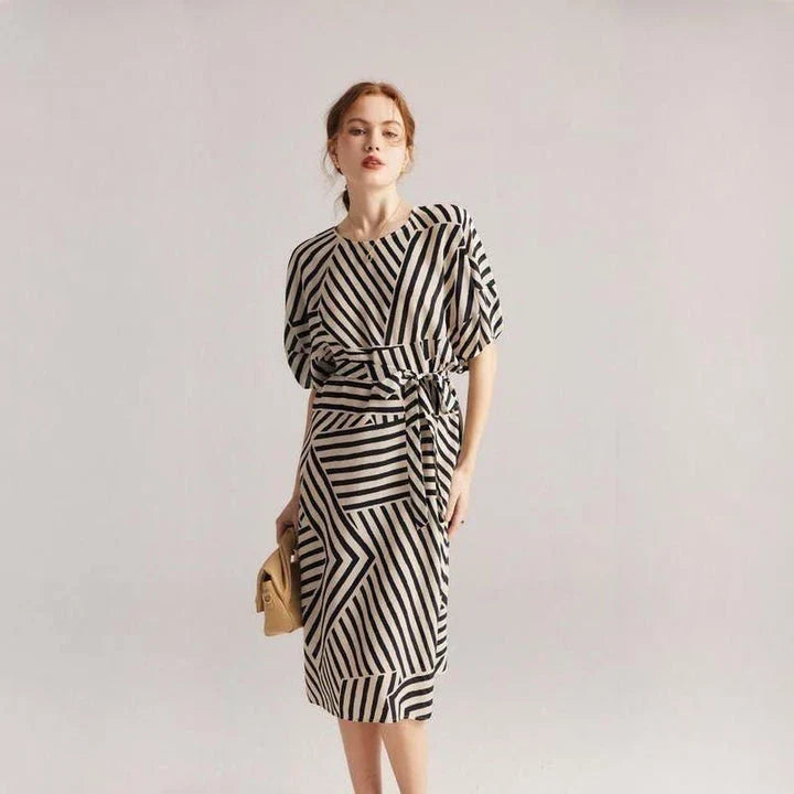 Elegant striped dress made from luxurious Mulberry silk with batwing sleeves, perfect for Kiwi women's fashion.