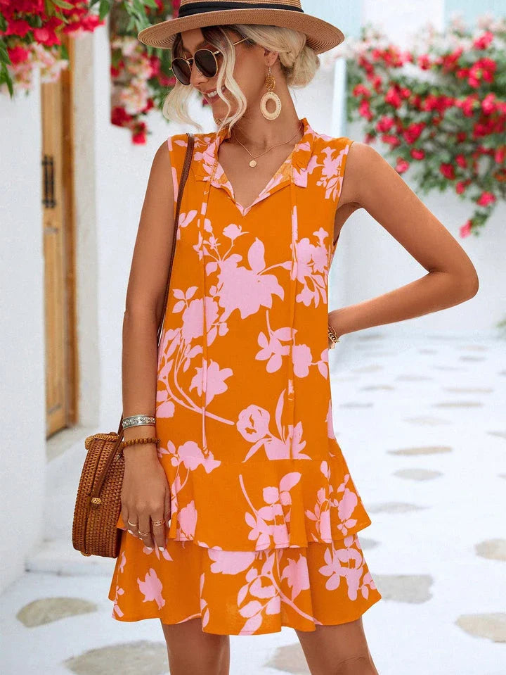 Stylish floral dress with tie neck and sleeveless design, perfect for everyday wear in New Zealand