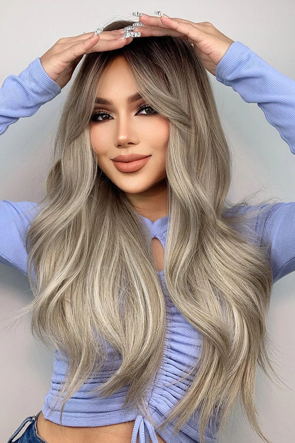 Stylish 26-inch long wave synthetic wig in silver/gray color with comfortable basic cap construction