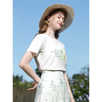 Embroidered casual summer tee for women in white with elegant graphic pattern