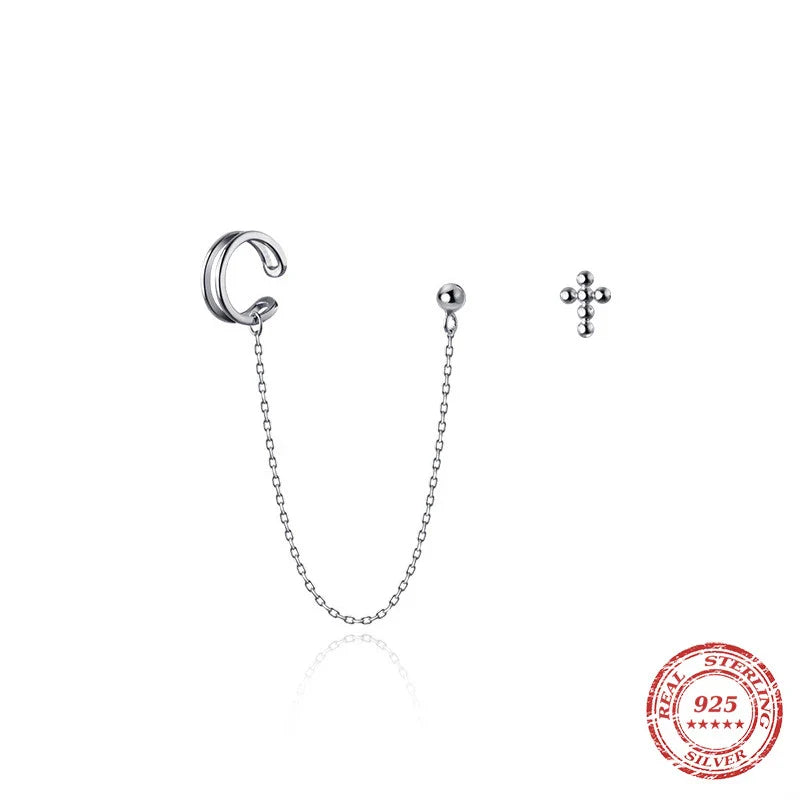 Unique one-piece sterling silver earring and ear clip set designed by New Zealand artist Xia Chunyin