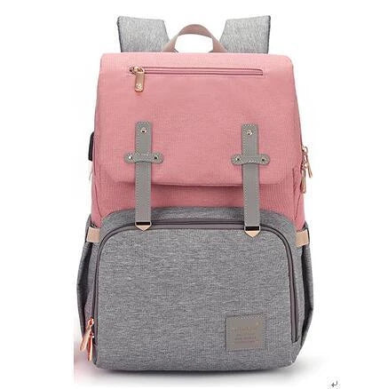 Versatile Mummy Daddy Backpack in Grey, a functional and stylish nappy bag for Kiwi families with a spacious main compartment, insulated pockets, and a USB charging port.