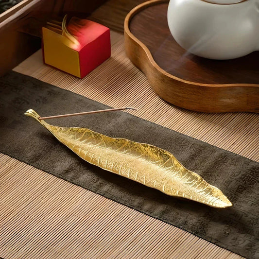 Elegant copper incense stick holder with Bodhi leaf design, perfect for creating a peaceful, serene atmosphere in your New Zealand home