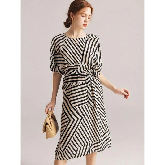 Elegant striped dress made from luxurious Mulberry silk with batwing sleeves, perfect for Kiwi women's fashion.