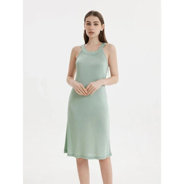Elegant silk-blend halter midi dress in green and white, perfect for Kiwi women's summer fashion