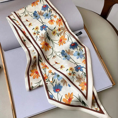 Elegant floral print scarf in soft, cotton-like polyester fabric - a versatile Kiwi accessory for year-round style