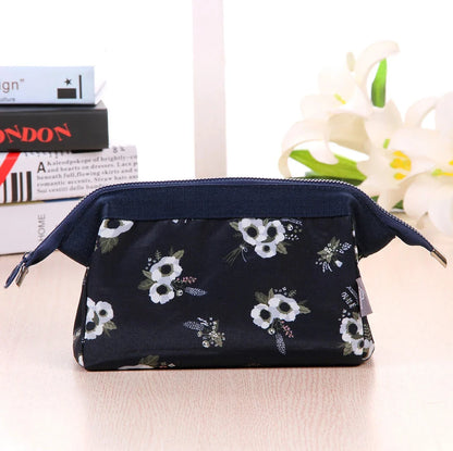 Flamingo-patterned travel makeup and toiletry bag with spacious interior and convenient storage pockets